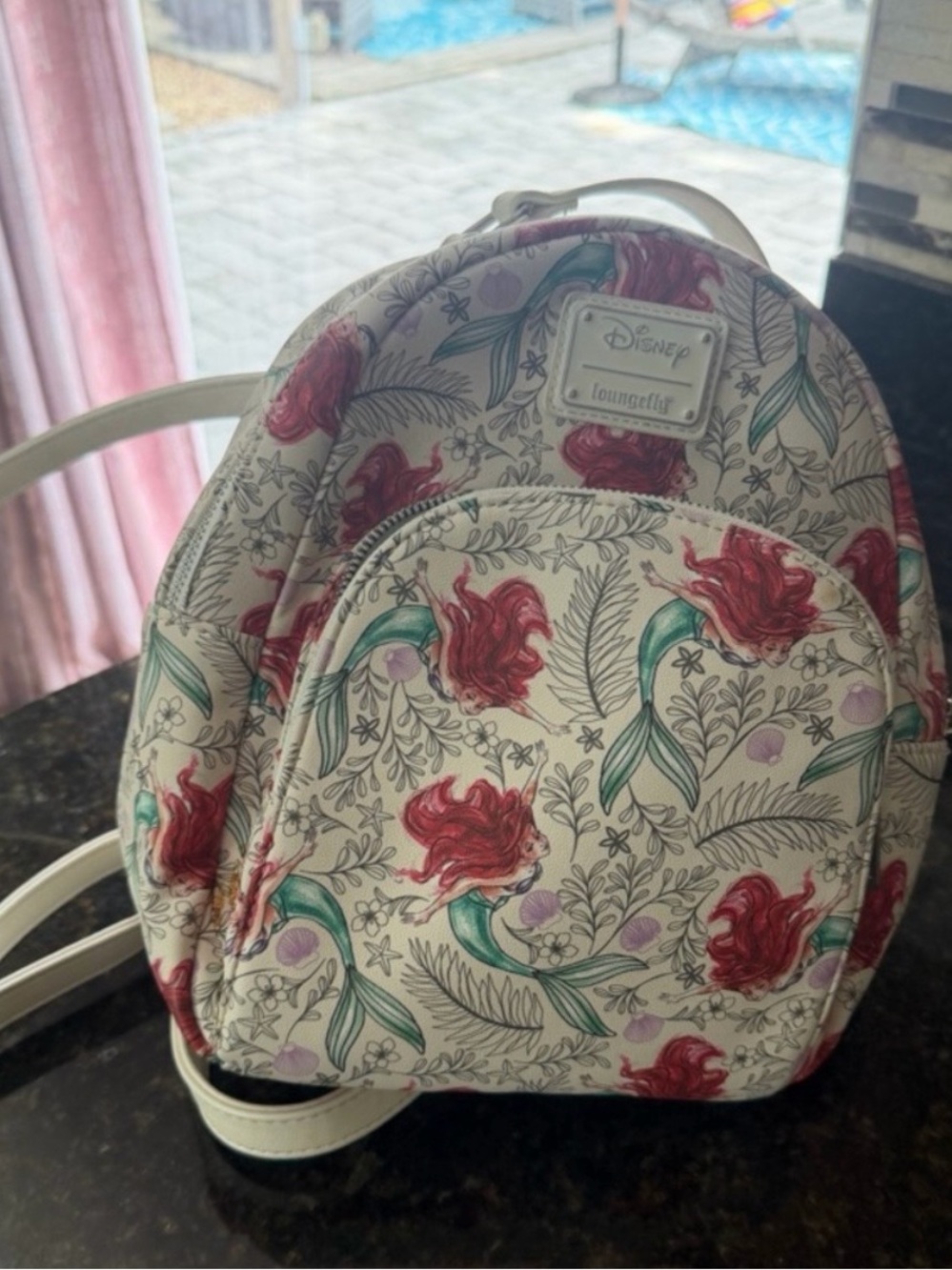 Loungefly Cream Mini Backpack with Red & Green Ariel Floral Print